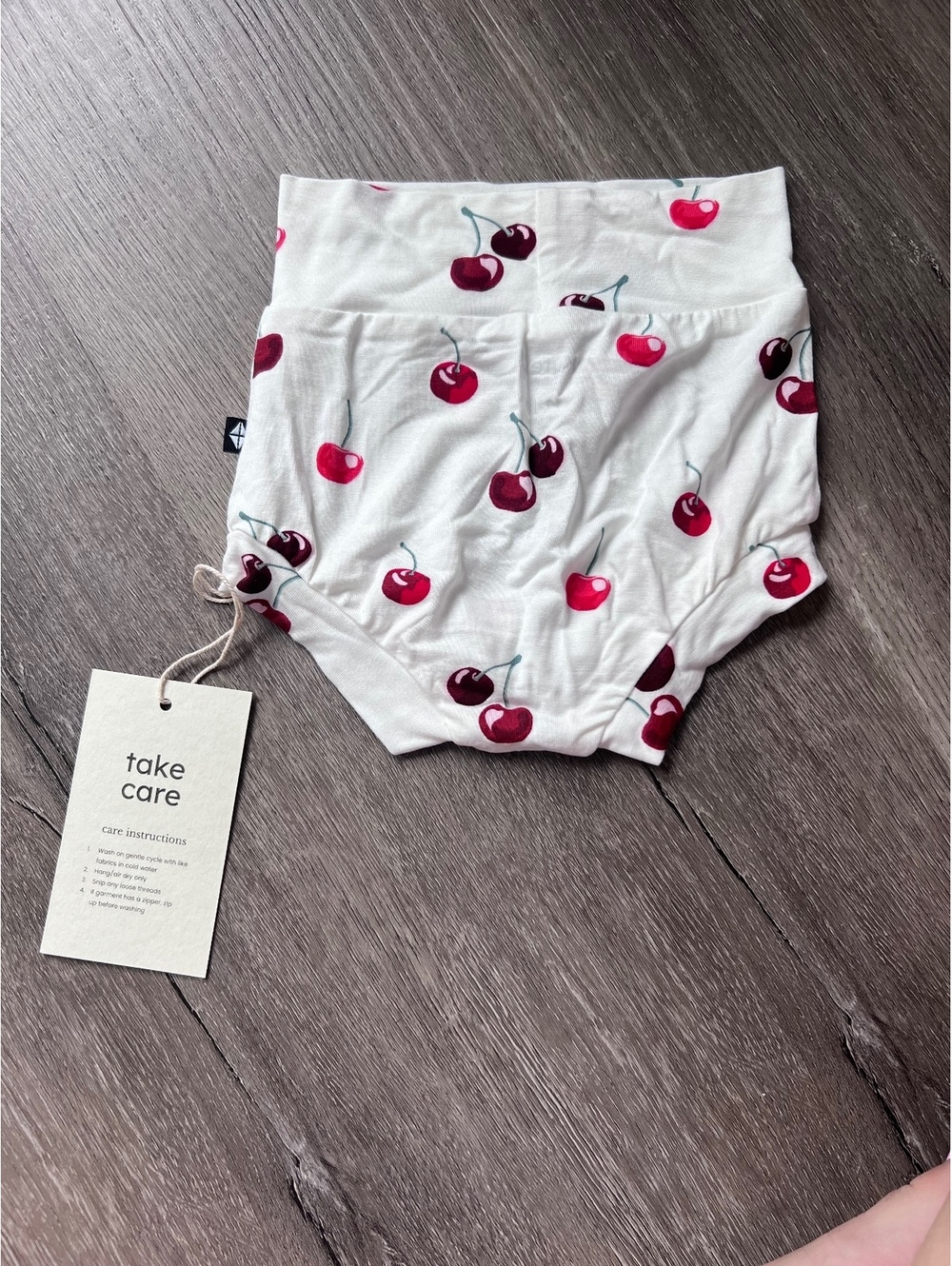 Kyte Baby bummies cherries - new with tags 12-18 months